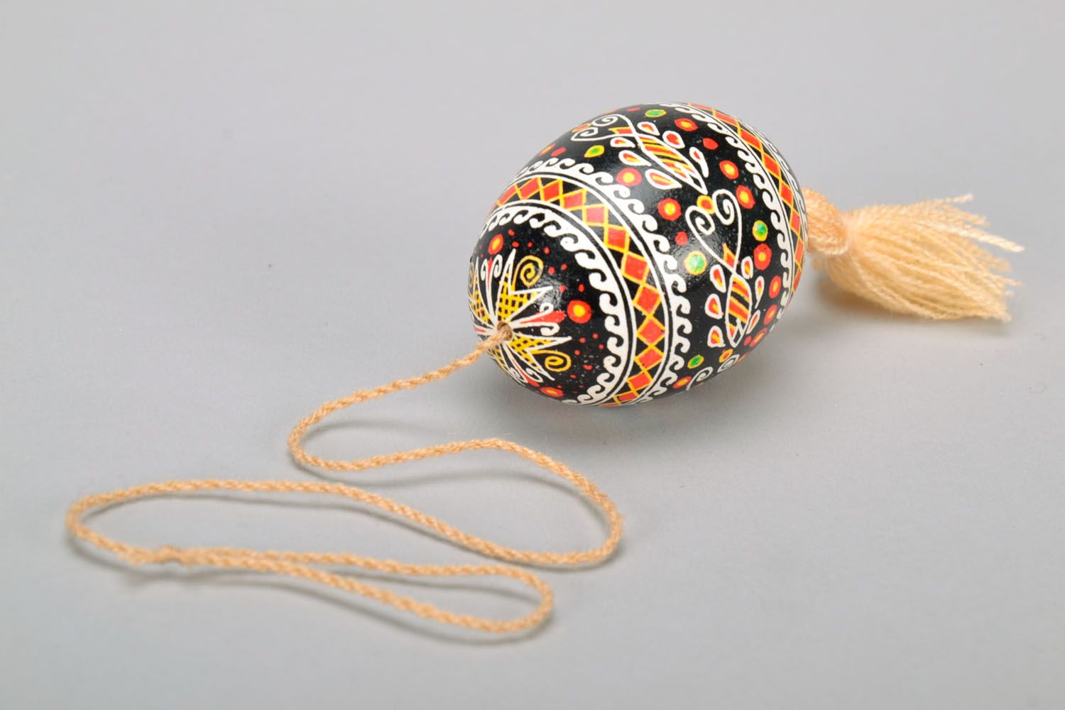 Painted egg with a tassel photo 5