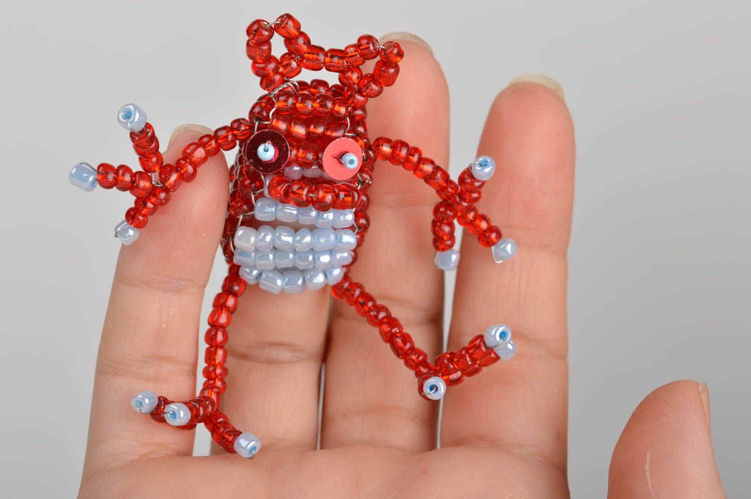 Пальчиковая игрушка лягушка красная забавная из китайского бисера ручной работы фото 3