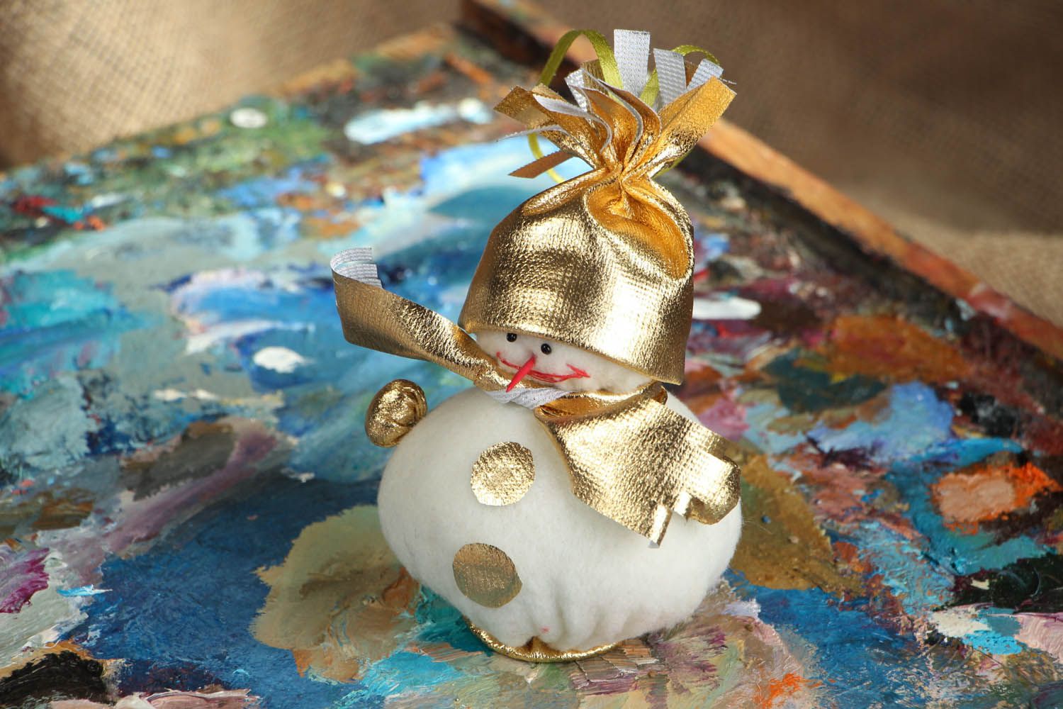 Snowman of beige and golden color photo 5