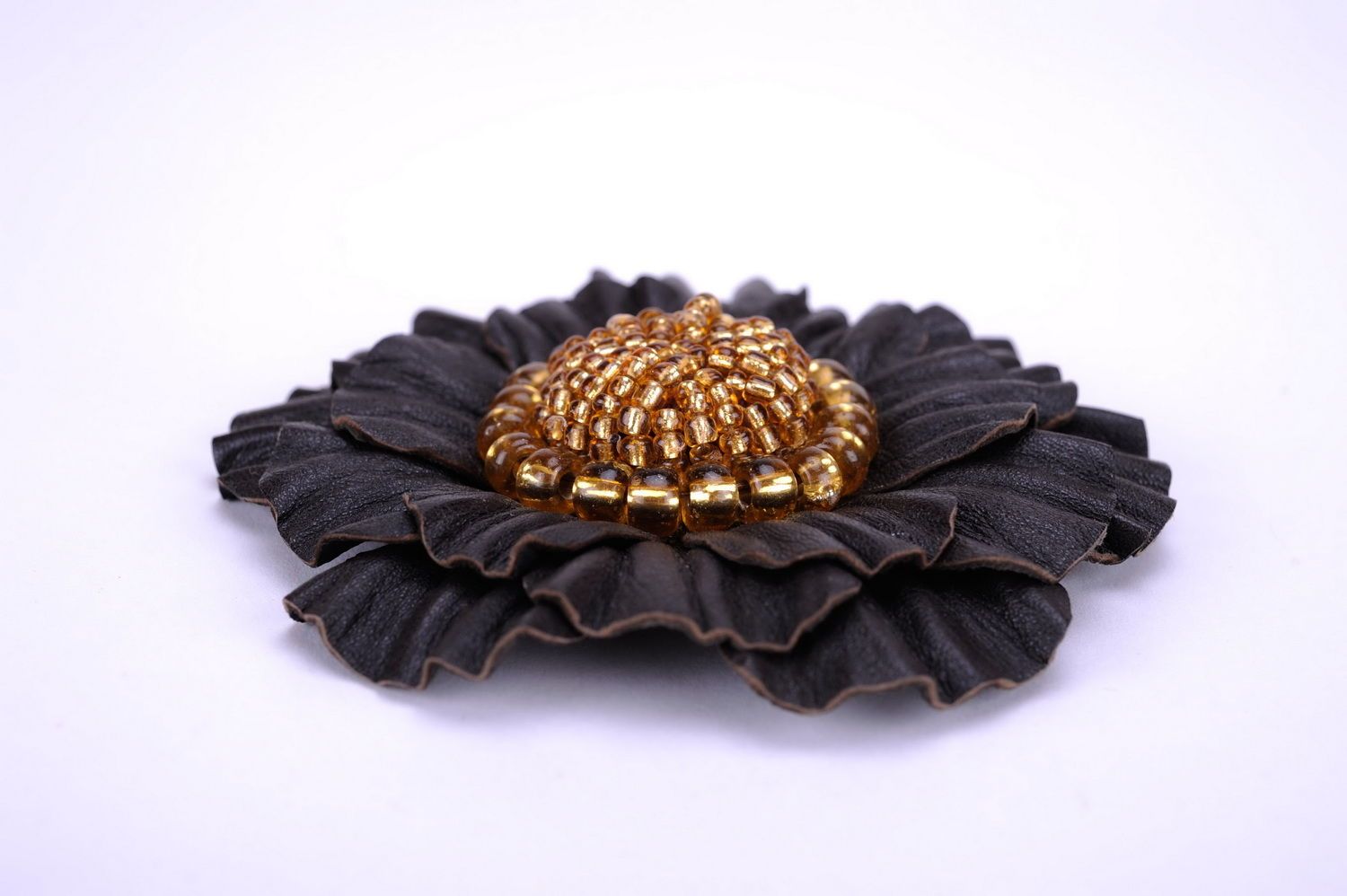 Leather flower brooch photo 1