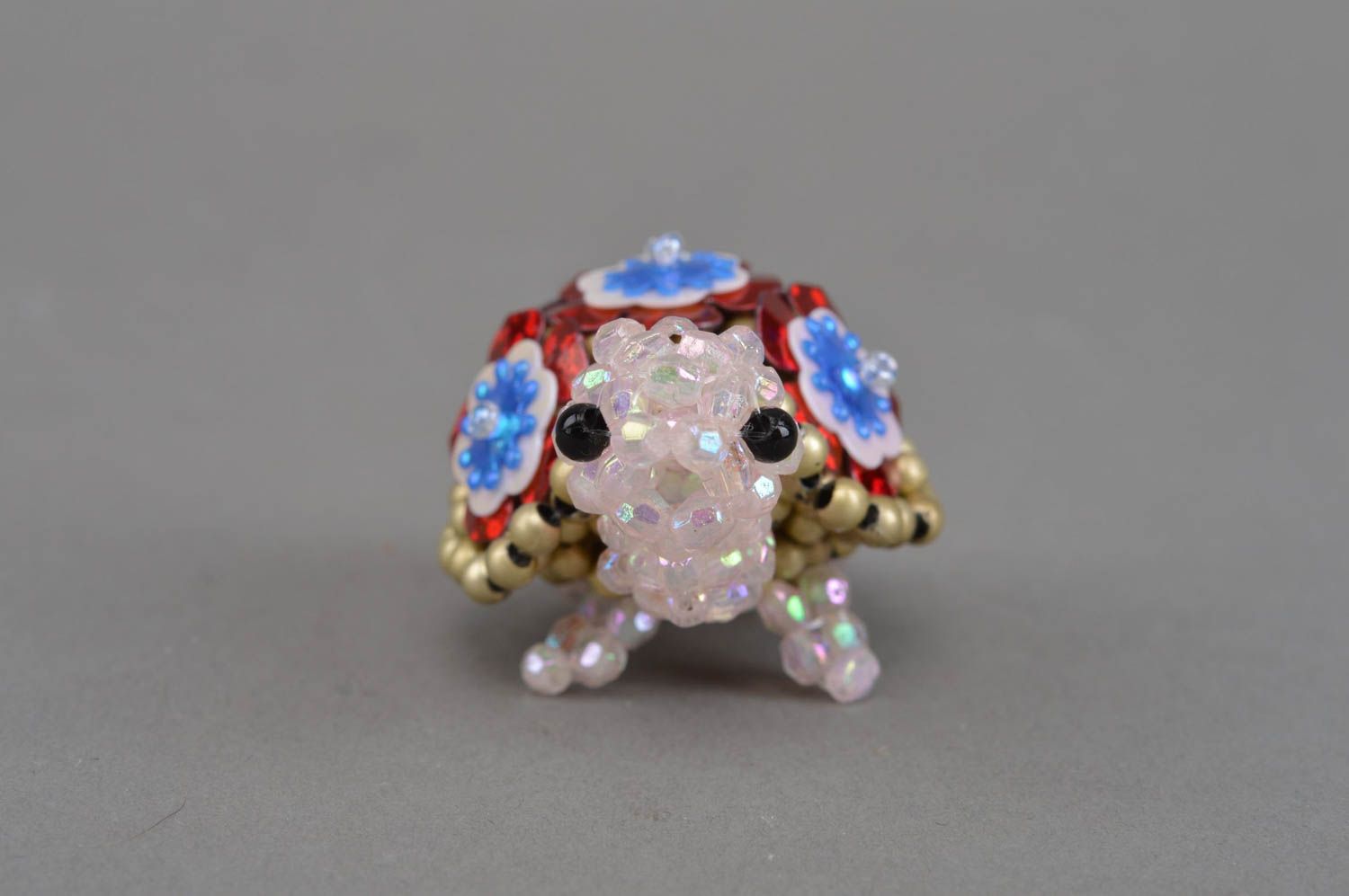 Handmade designer miniature bead woven figurine of turtle with flowers on armor photo 4