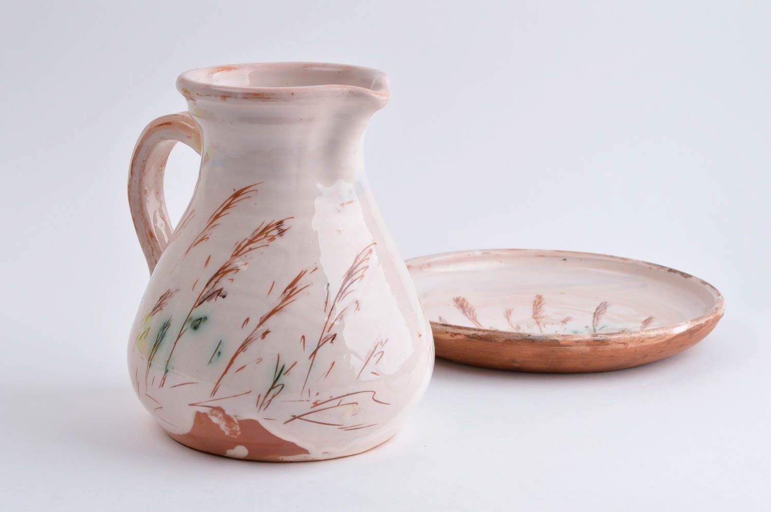 Jarro de cerámica artesanal y platillo decoración de cocina elemento decorativo foto 4