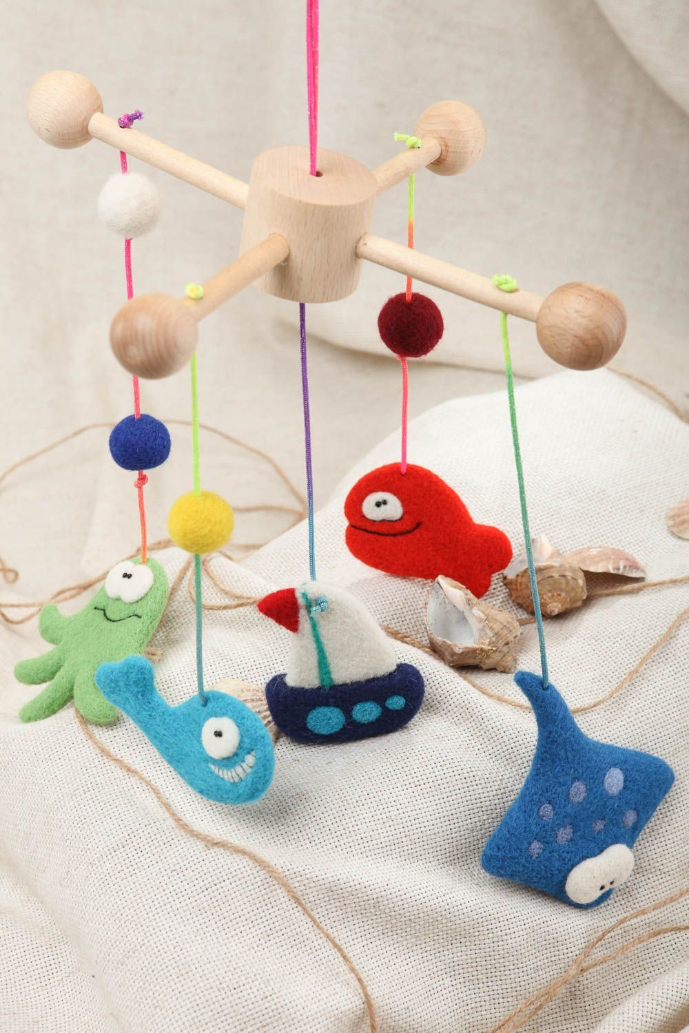 Mobil for cradle with colorful toys made of natural wool handmade baby toys photo 6