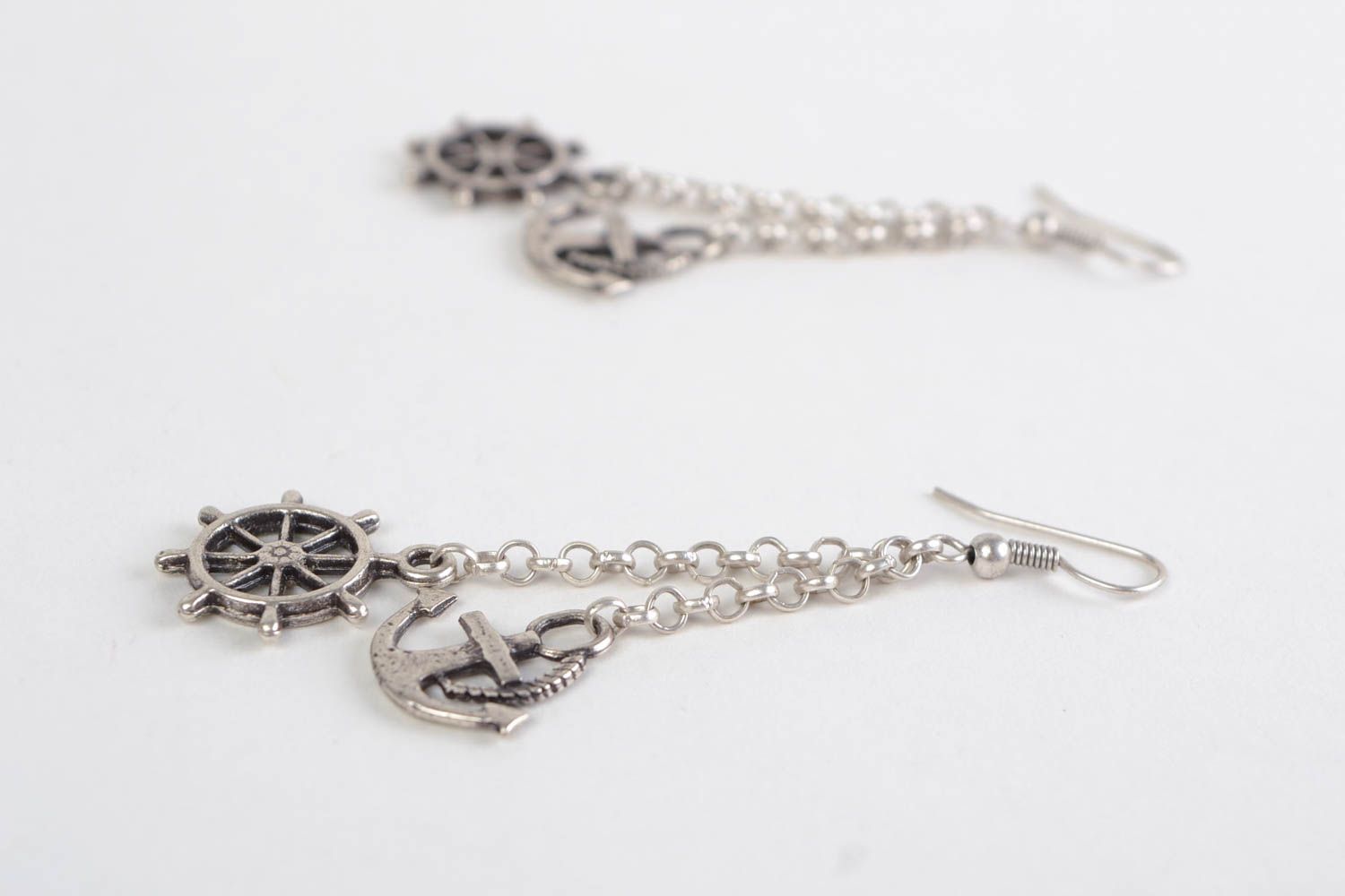 Handmade designer long dangling earrings cast of metal alloy anchor and wheel  photo 5