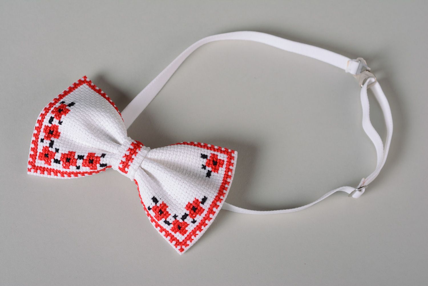 Handmade designer white bow tie with embroidered bright floral motives for men photo 2