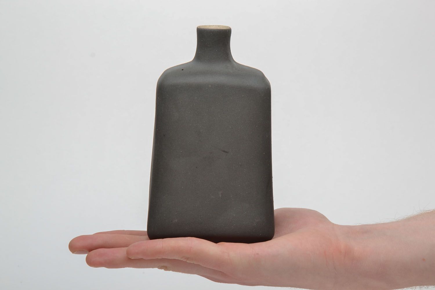 Botella de cerámica negra foto 5