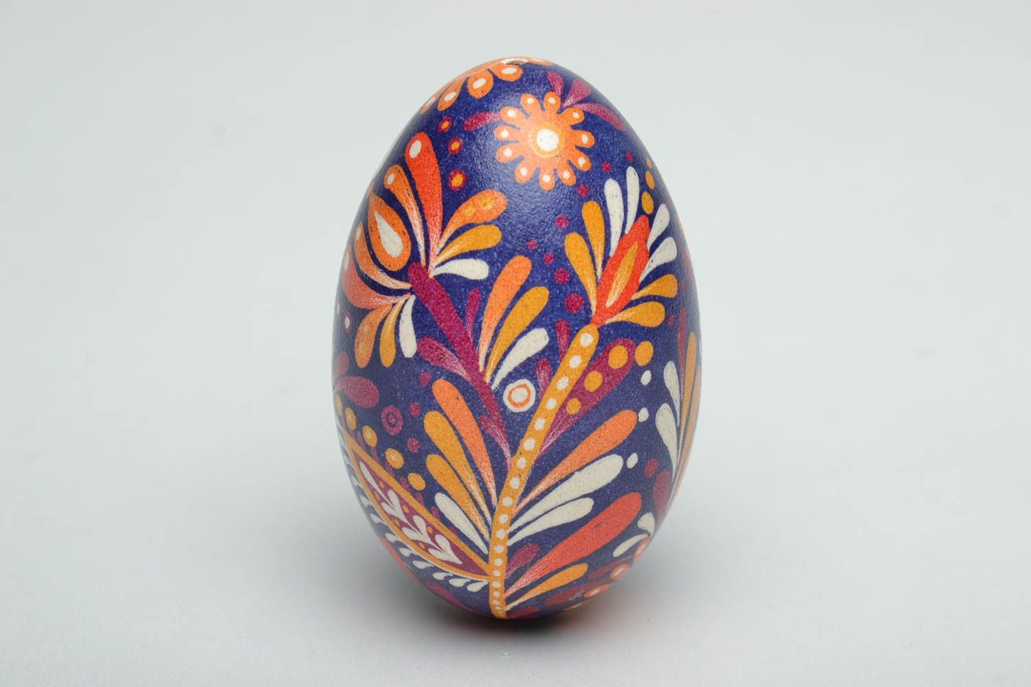 Easter egg painted with floral motives using wax technique photo 4