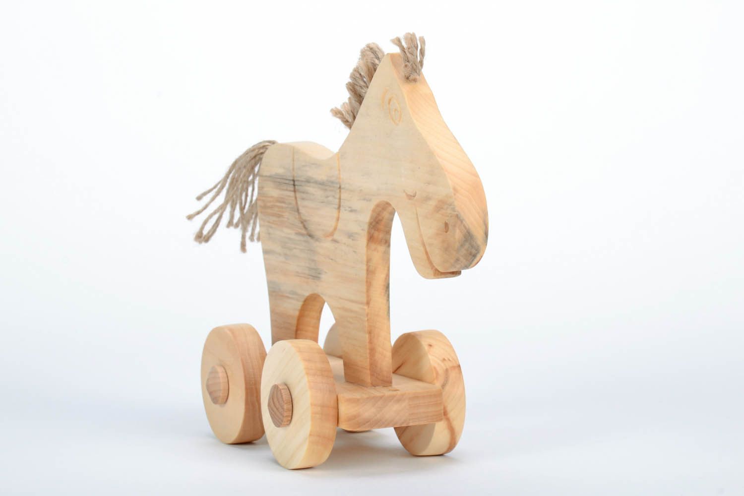 Wooden horse with wheels photo 4