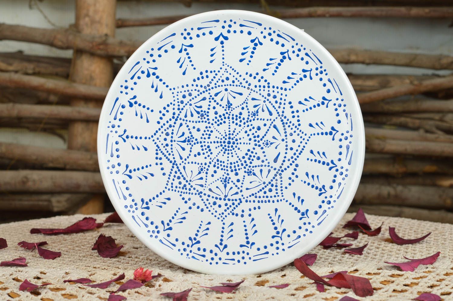 Decorative white with blue ceramic plate with acrylic paints ornament  photo 1