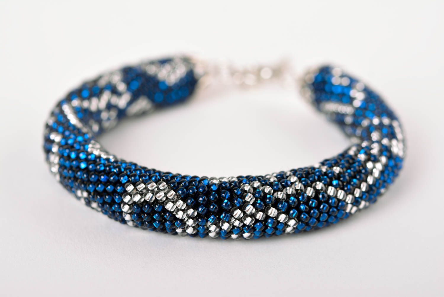 Beaded cord all size bracelet in dark blue color photo 1