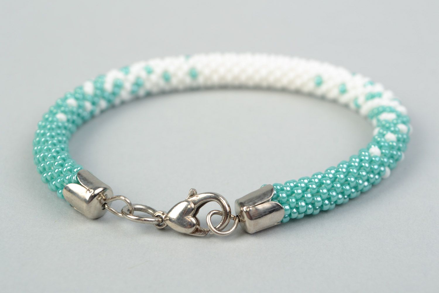 Tender handmade beaded cord wrist bracelet in white and turquoise color  photo 4