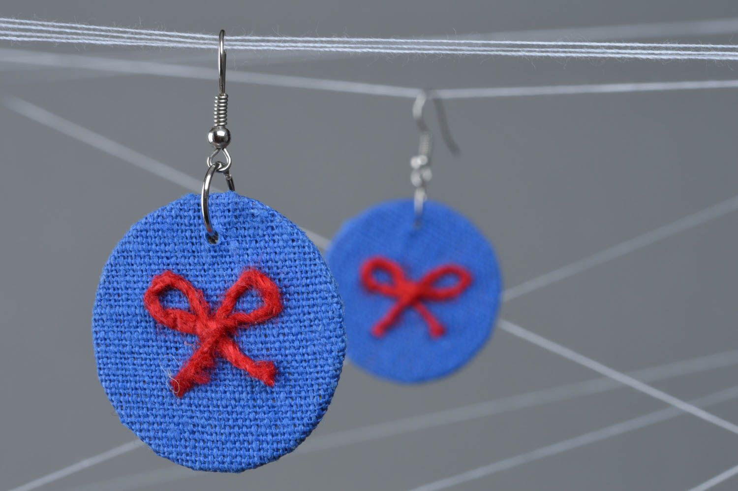 Handmade small round bright blue fabric dangling earrings with red bows photo 4
