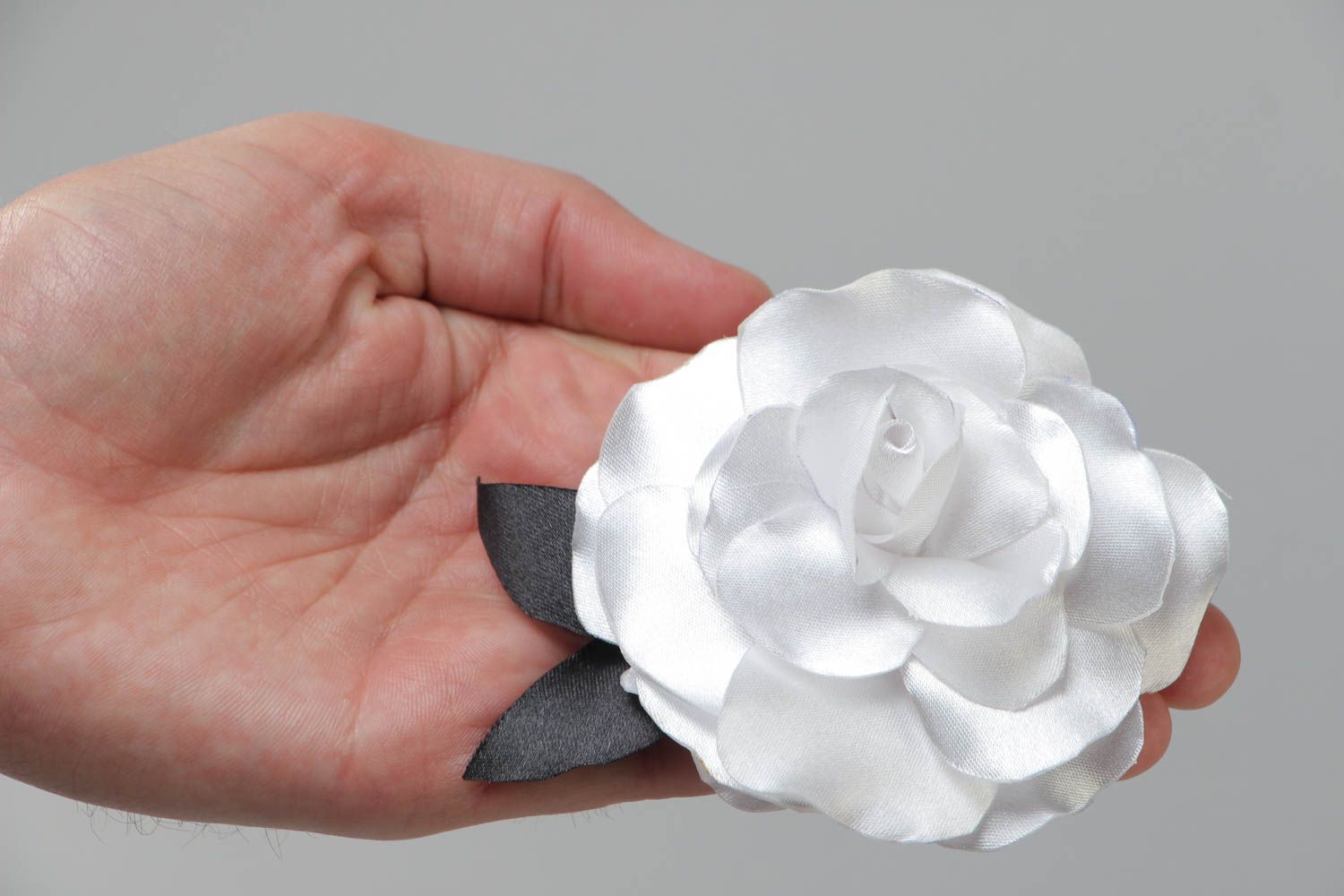Handmade hair clip with volume white satin rose flower with black leaves photo 5