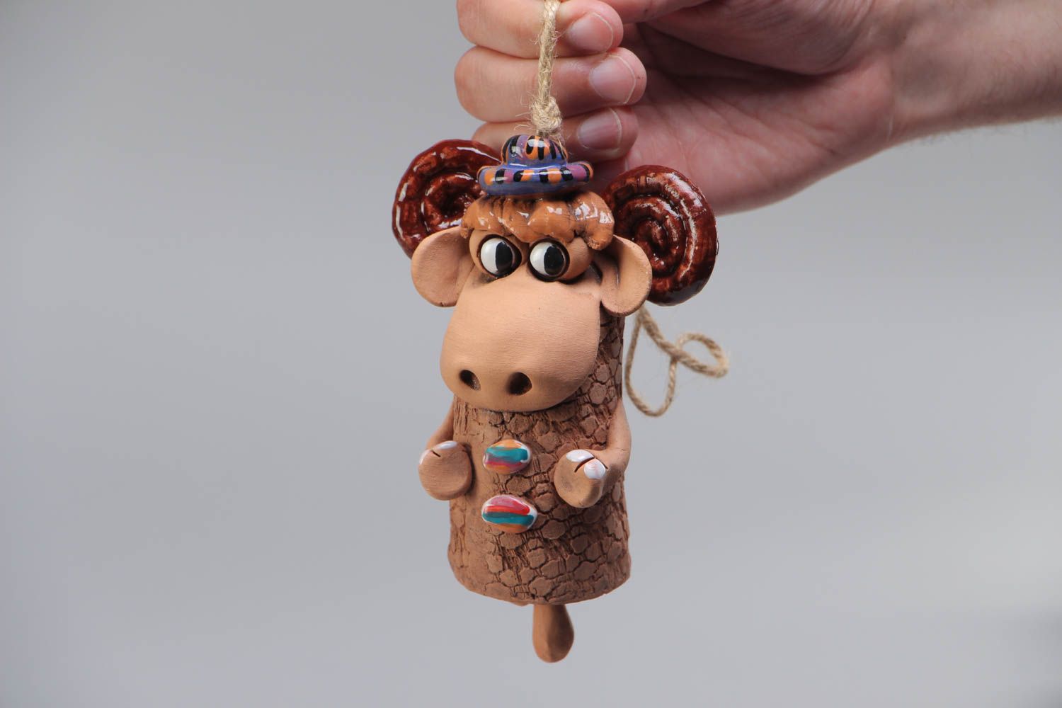 Handmade decorative ceramic bell painted with acrylics in the shape of lamb photo 5