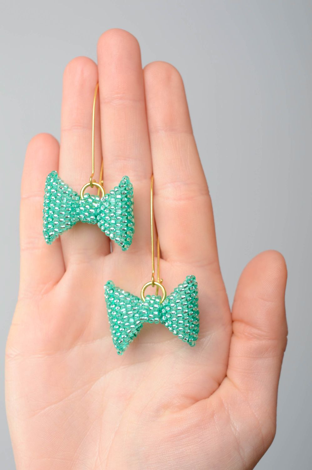 Turquoise handmade beaded earrings Bows photo 2