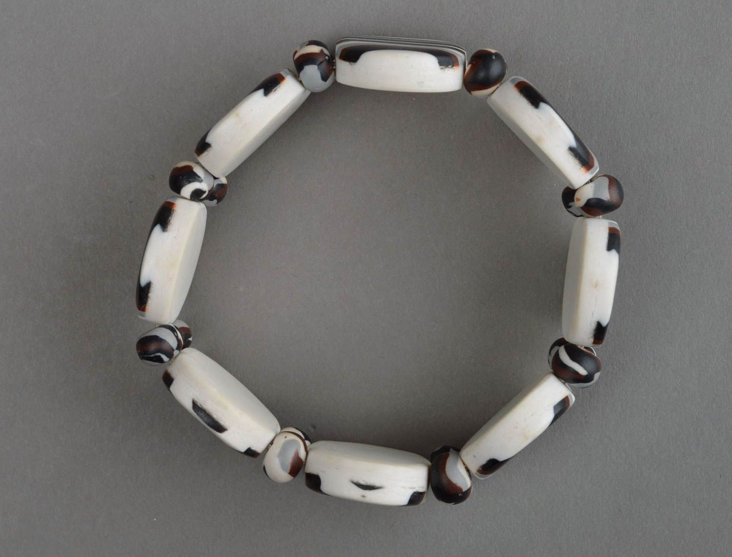 White, grey, brown colors' fashion bracelet on elastic cord photo 4
