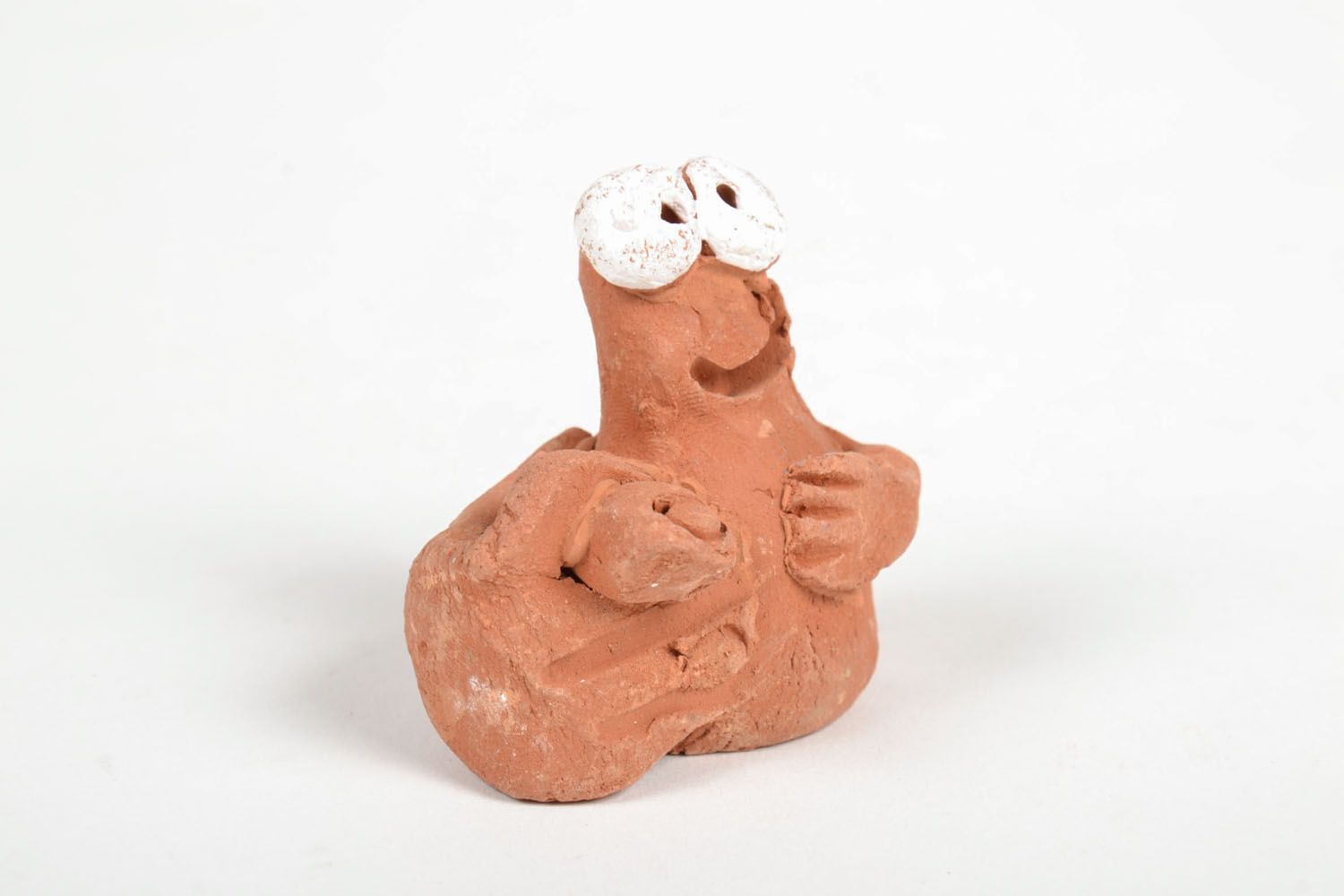 Смешная фигурка из гончарной глины фото 2