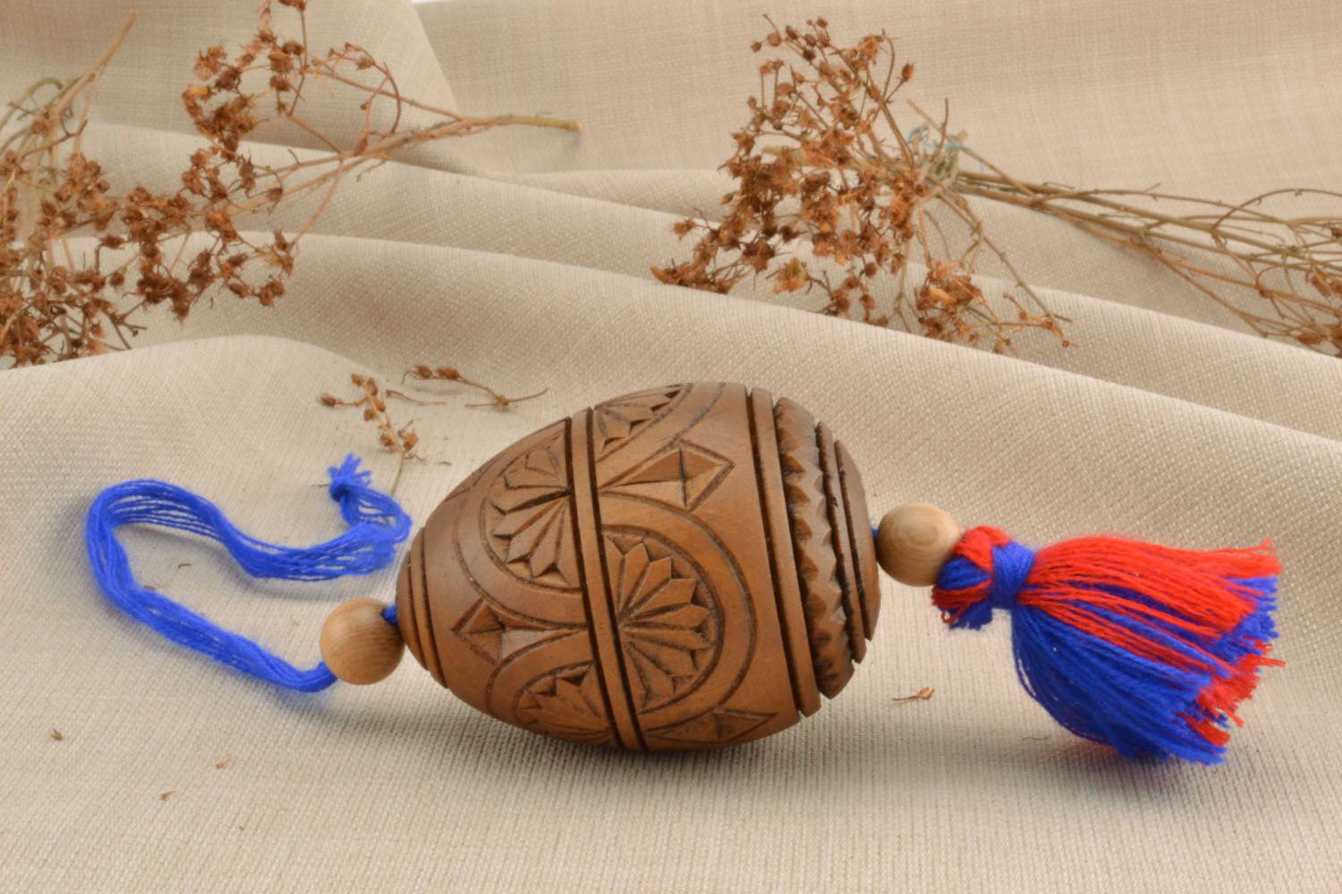 Carved wooden egg in the form of interior pendant photo 1