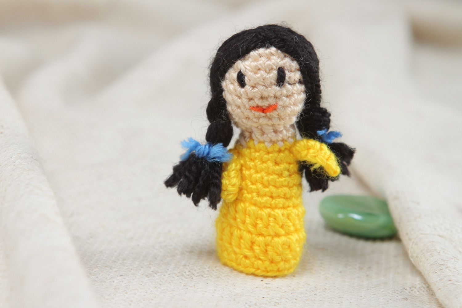 Handmade finger puppet crocheted of acrylic threads girl in yellow dress photo 5