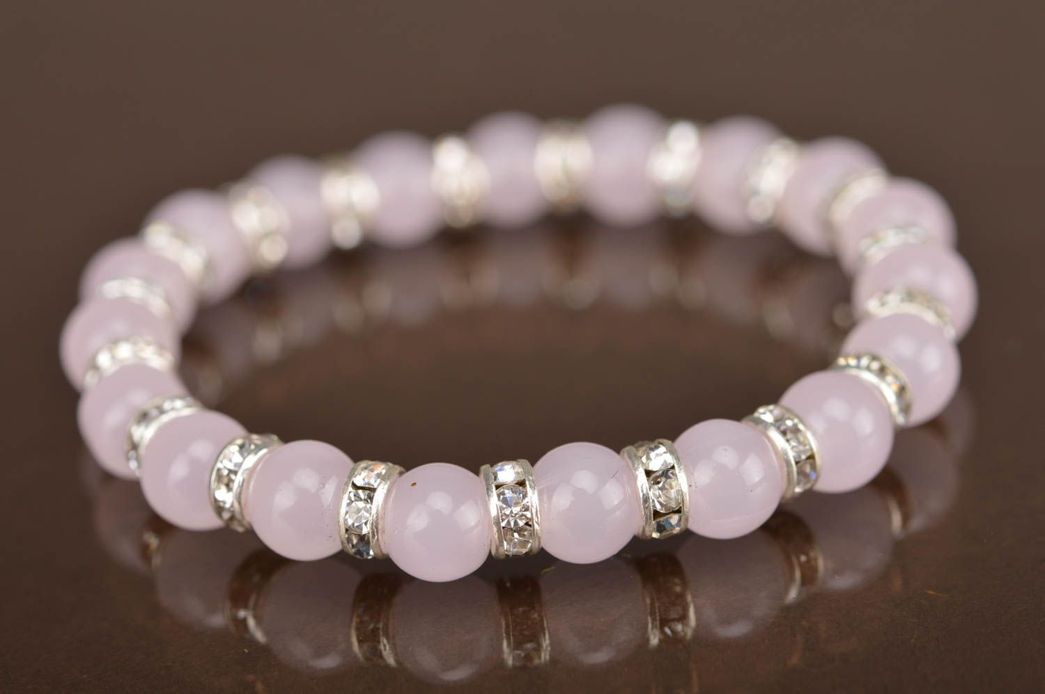 Beautiful handmade designer stretch wrist bracelet with gentle pink beads photo 5