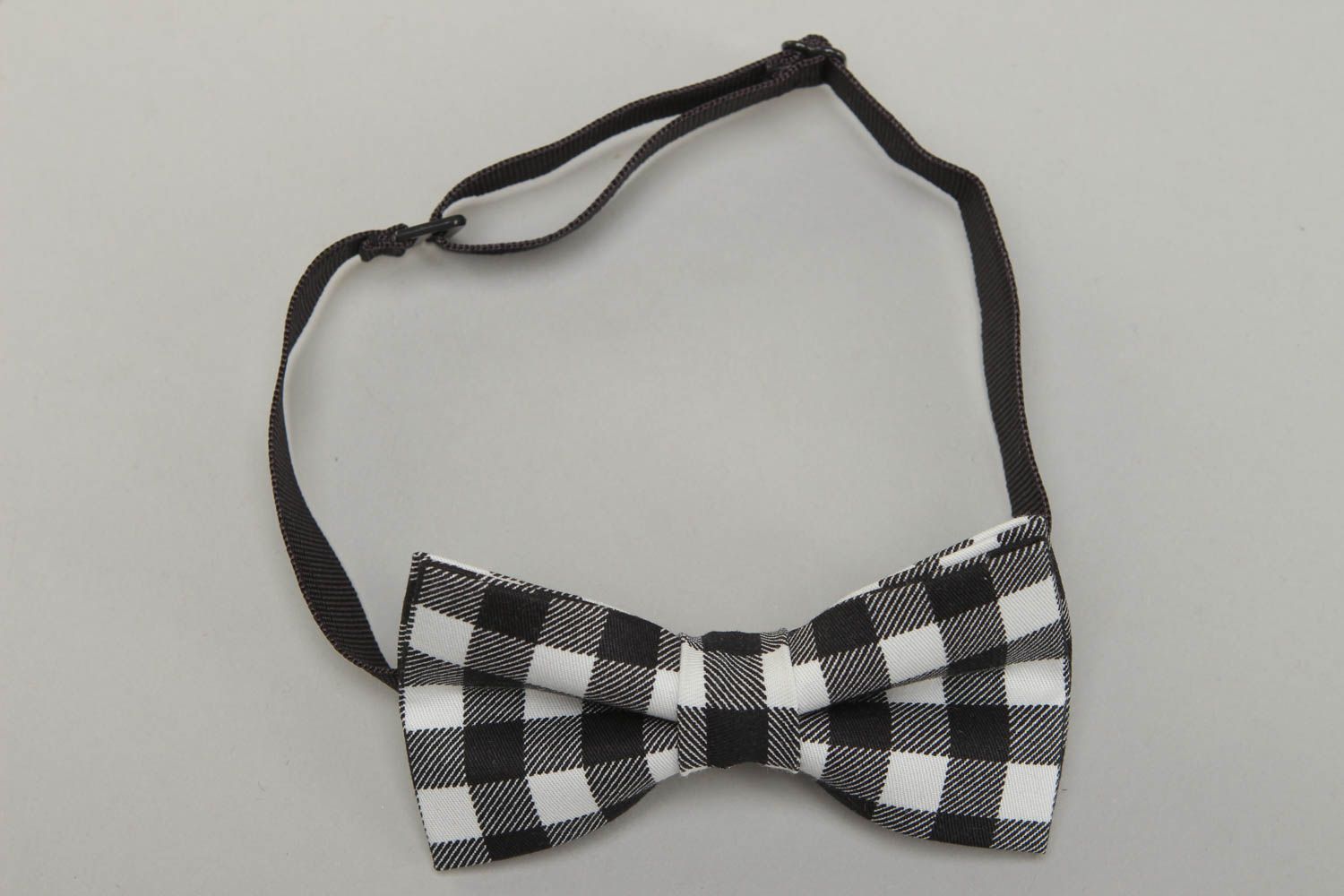 Black and white checkered bow tie photo 1
