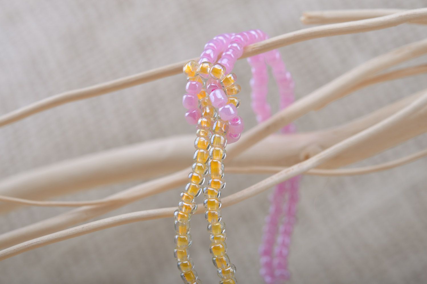 Handmade beaded jewelry set in tender colors dangle earrings and wrist bracelet photo 4