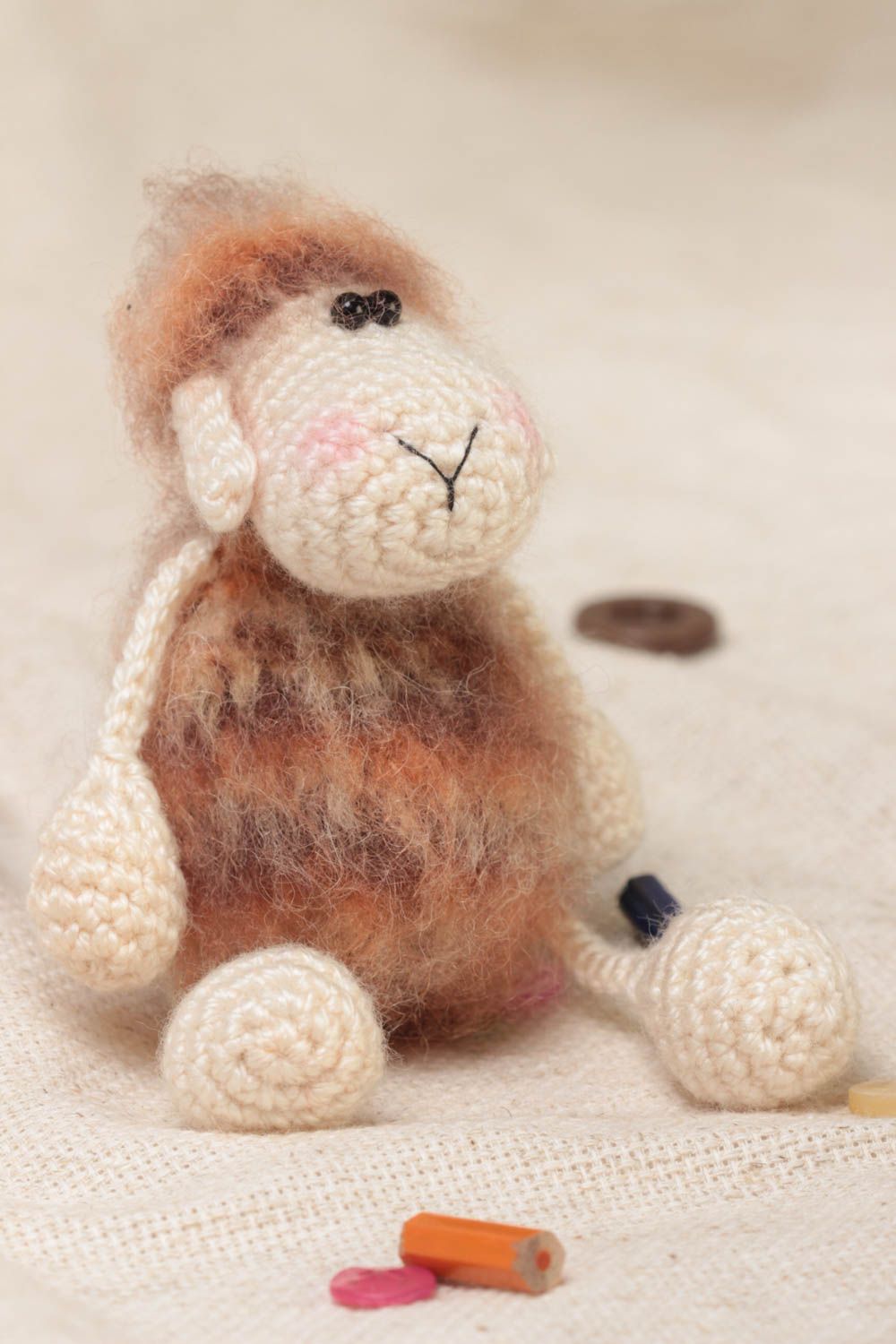 Handmade small crocheted soft toy lamb with fluffy body in beige color shades photo 1