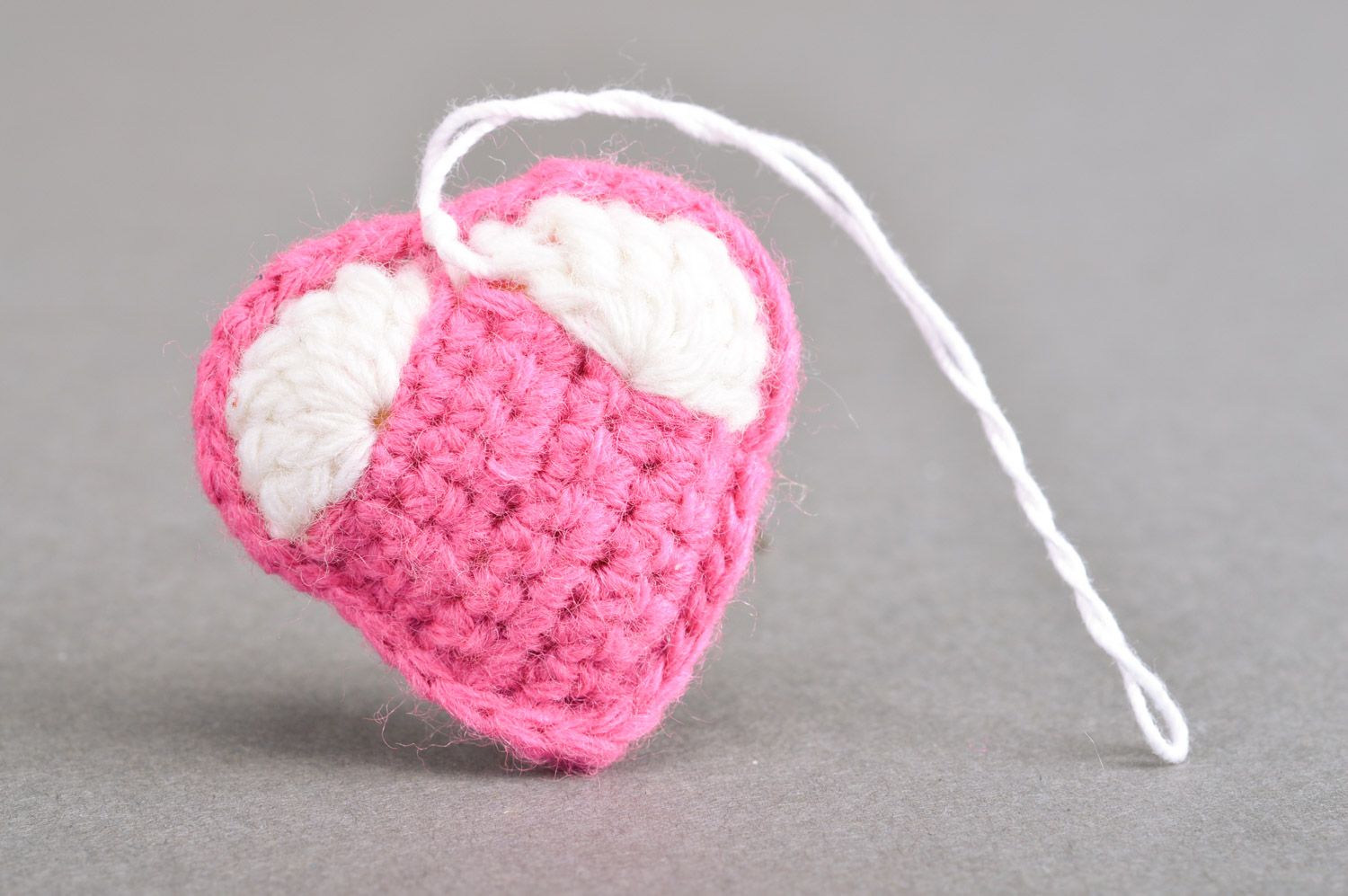 Handmade heart-shaped keychain crocheted of pink and white semi-woolen threads photo 5