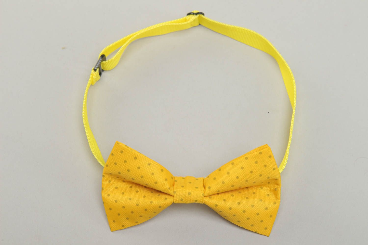 Polka dot yellow cotton fabric bow tie photo 1