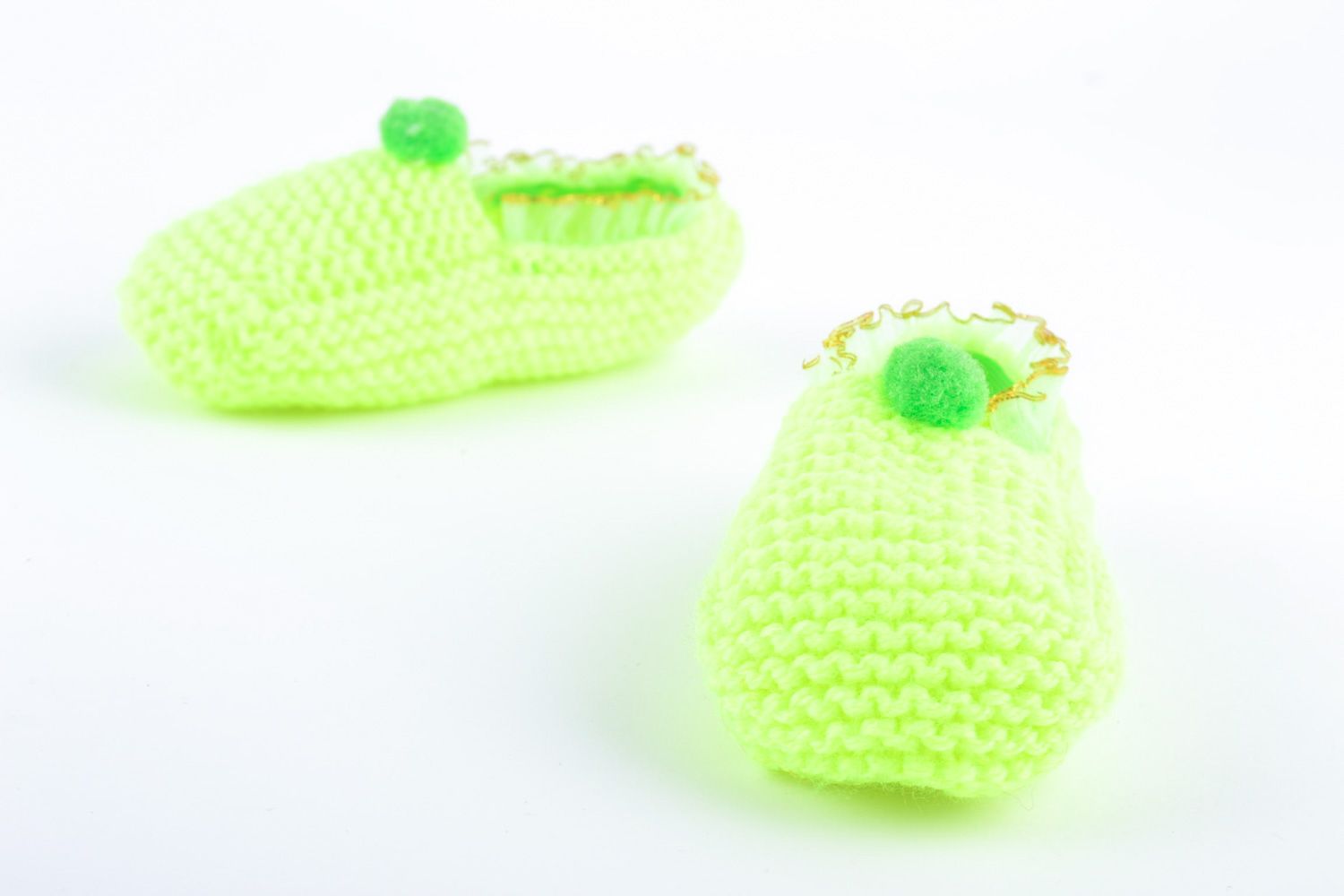 Beautiful light hand knitted wool slippers of lime color photo 4