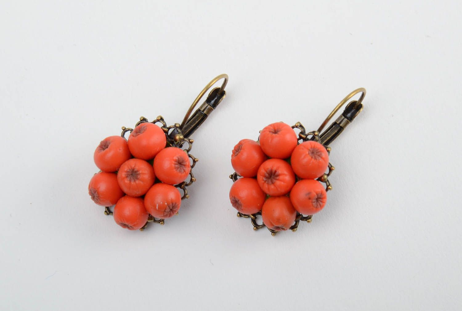 Handmade designer dangling earrings with cold porcelain berries of orange color photo 3