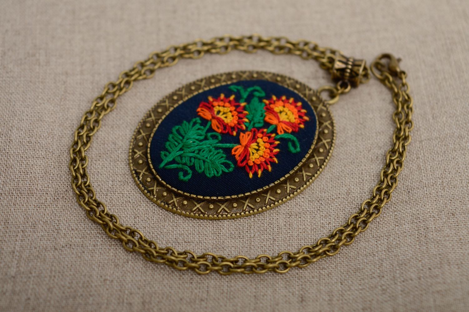 Vintage pendant with embroidery photo 1