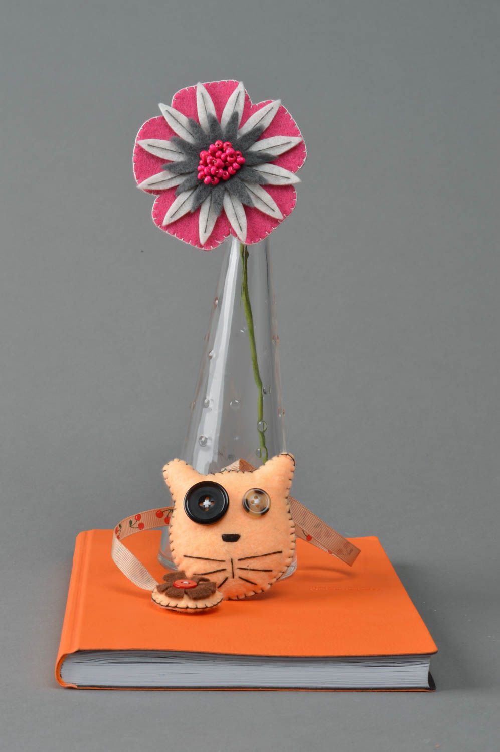 Beautiful designer handmade fabric soft bookmark toy cat of peach color photo 1