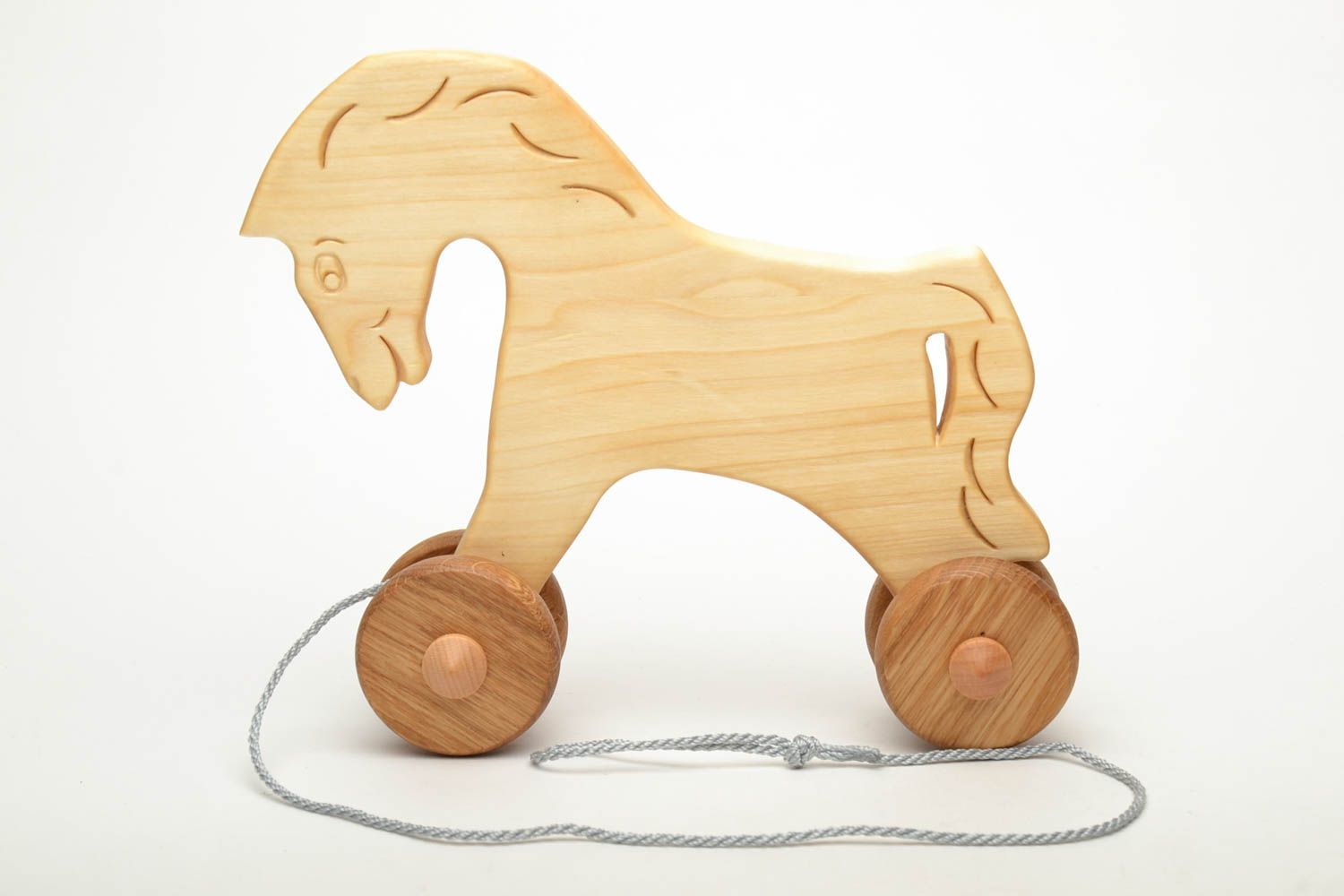 Деревянная игрушка лошадка на веревочке фото 2
