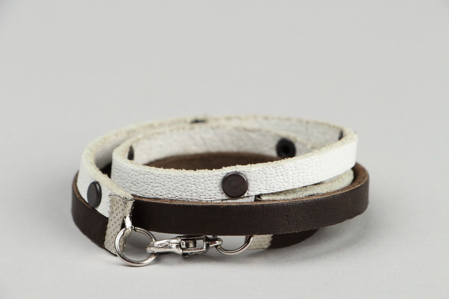 Leather bracelet with rivets. photo 4