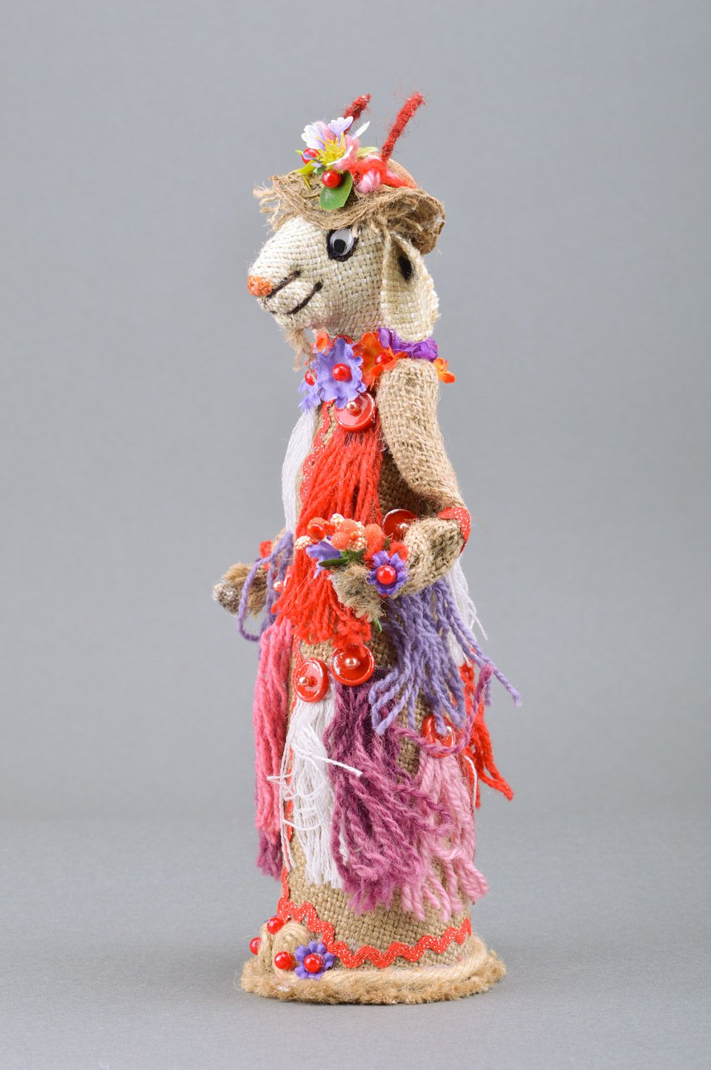 Handmade decorative bottle cozy sewn of burlap Goat in bright ethnic clothes photo 4