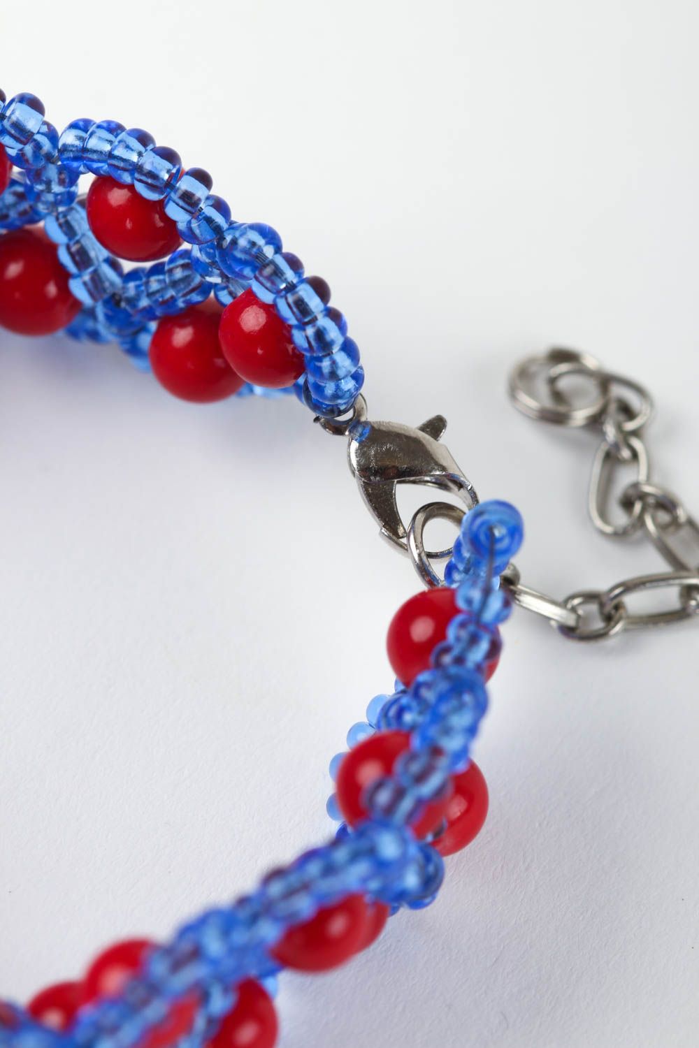 Blue and red beads bracelet on the adjustable chain photo 4