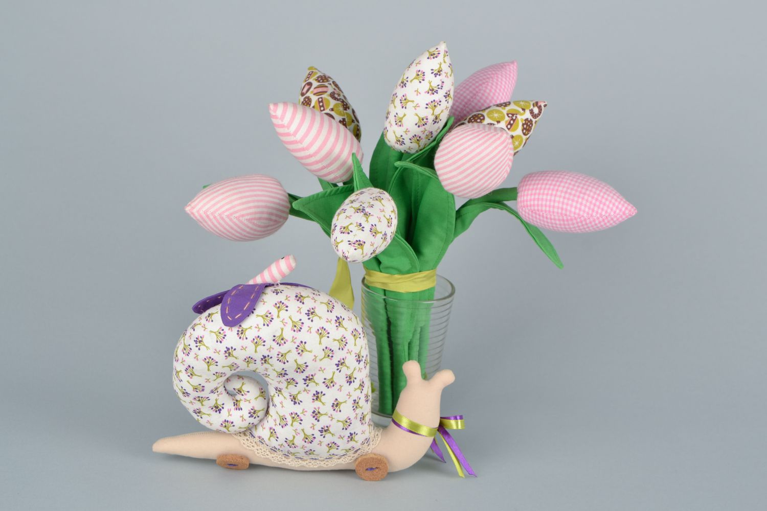 Interior decorative composition soft toy snail with tulips and decorative flowers photo 5