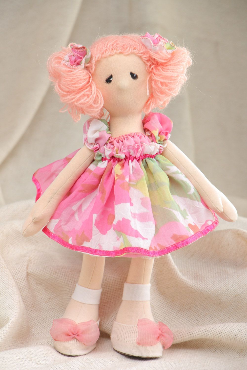 Handmade fabric soft doll of average size in pink dress  photo 1