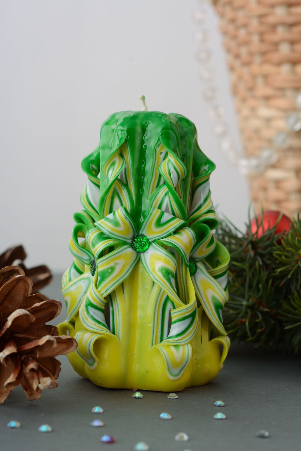 Green and yellow paraffin candle photo 1