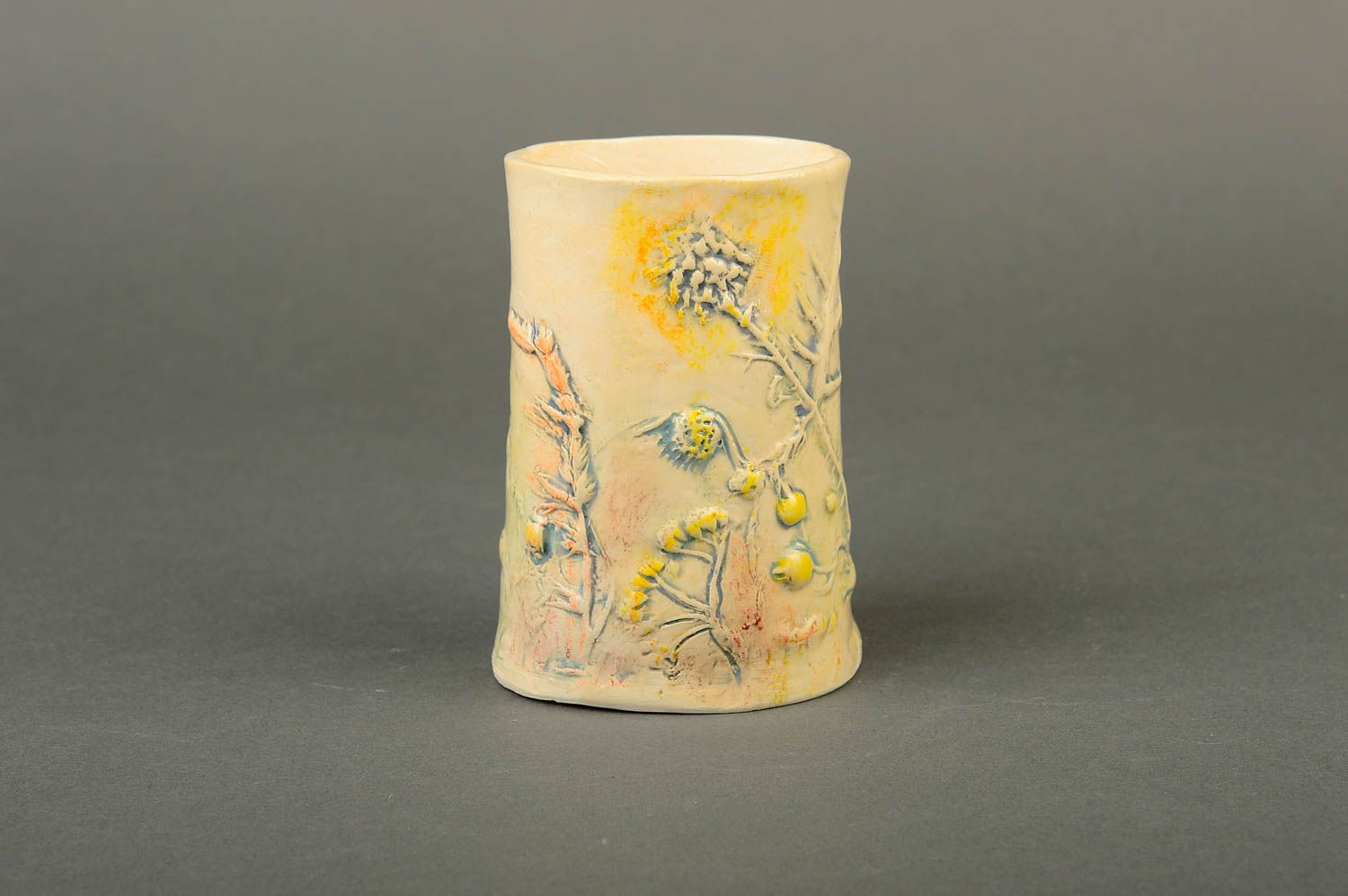 Ceramic glazed yellow color drinking cup with no handle and field flowers pattern photo 1