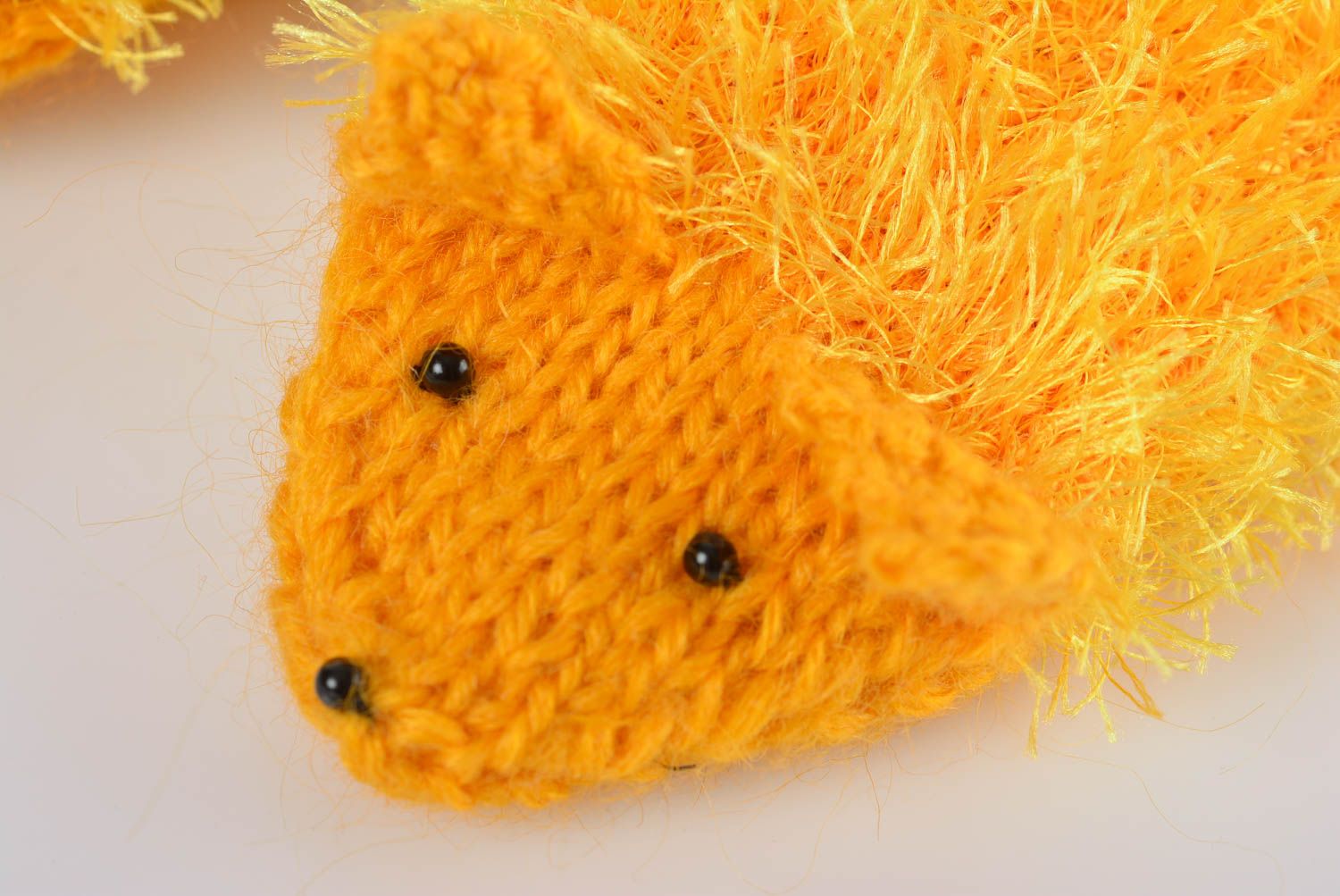 Bright handmade knitted yellow mittens made of wool warm soft winter accessory photo 2