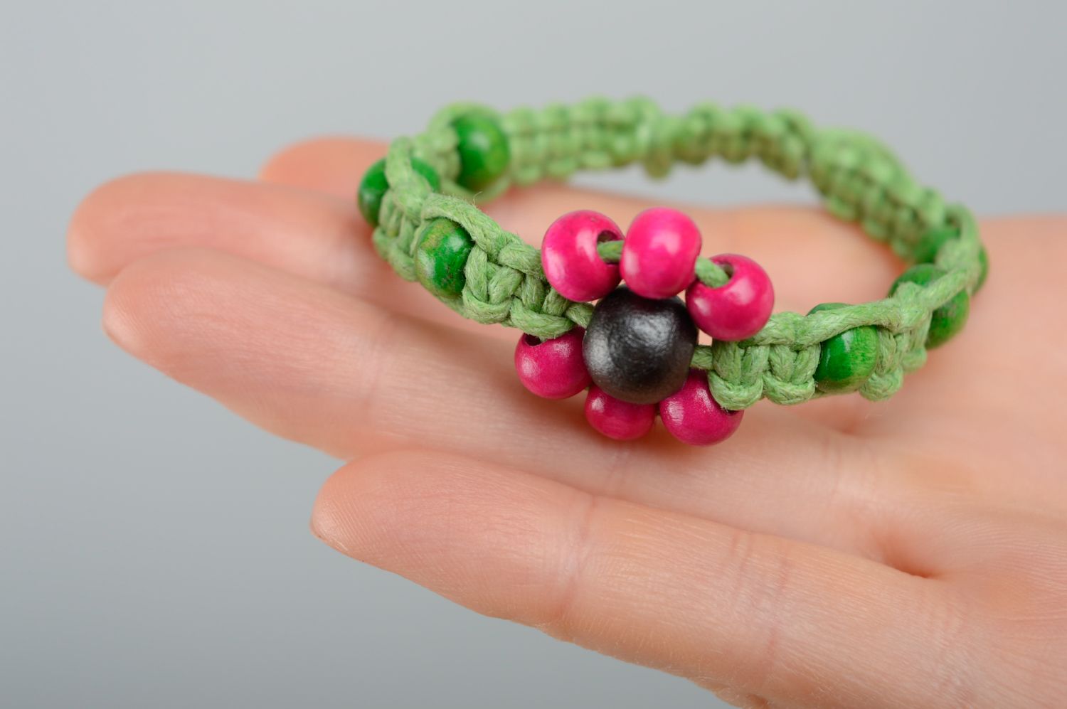 Bright macrame bracelet with wooden beads photo 3