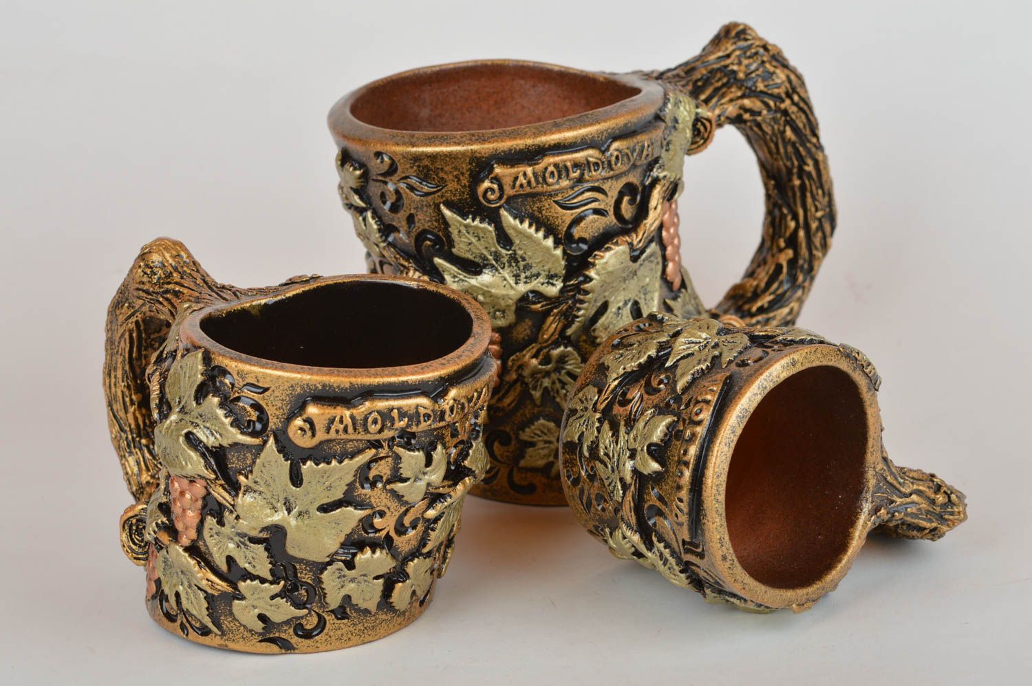 Set of 3 handmade ceramic wine bottle holders of different sizes photo 5