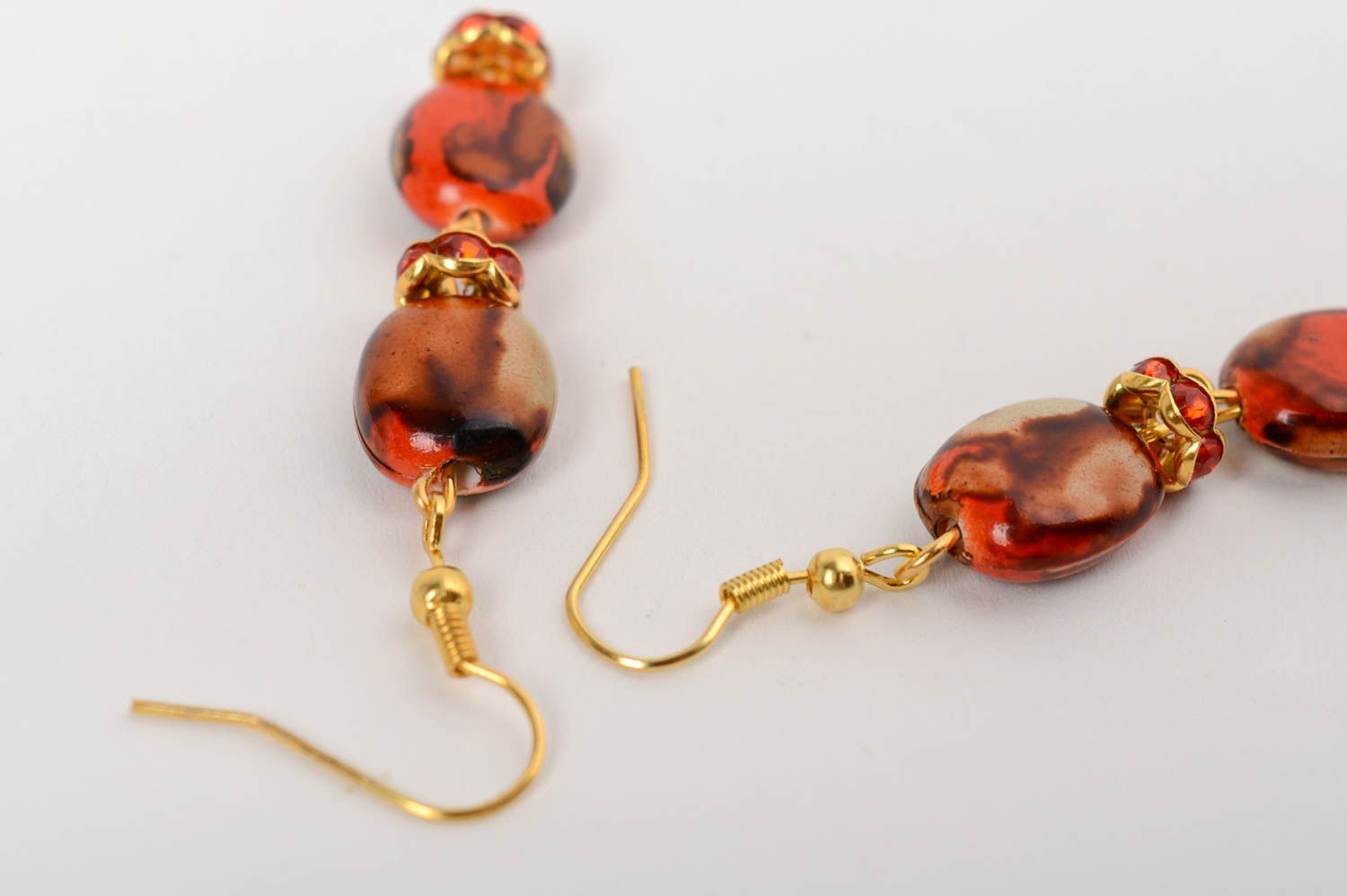 Handmade dangle earrings with plastic beads in red and brown color palette photo 3