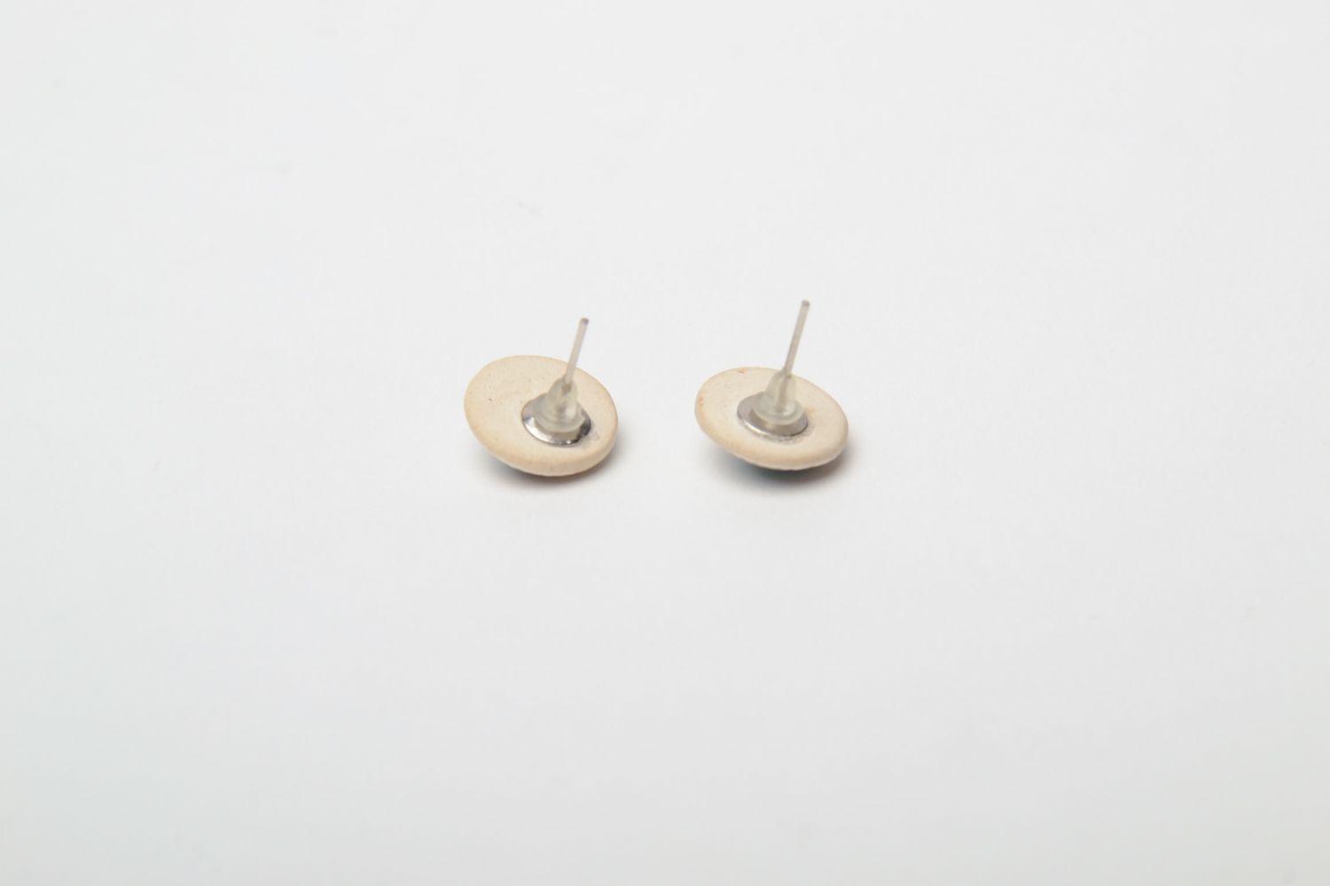 Small tender round ceramic earrings photo 5
