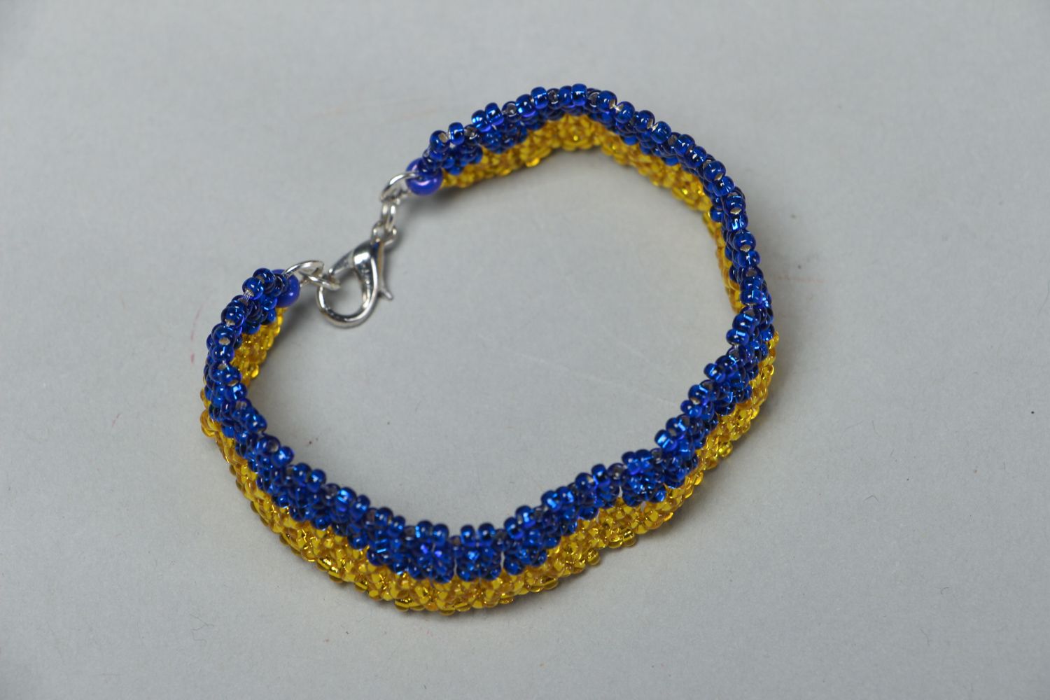 Handmade beaded bracelet in blue and yellow color  photo 2