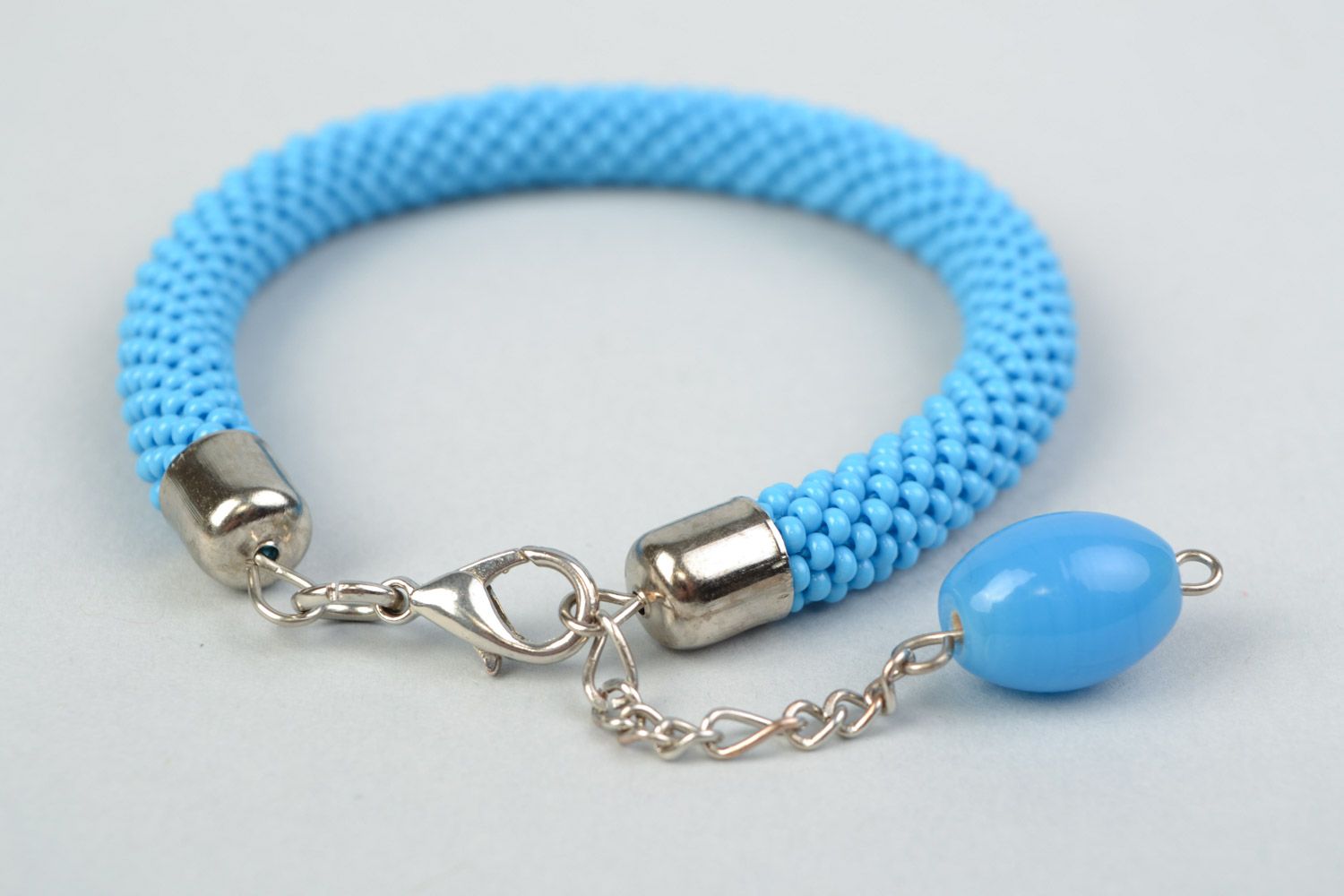 Handmade blue wrist bracelet crocheted of Czech beads with bead charm for women photo 4
