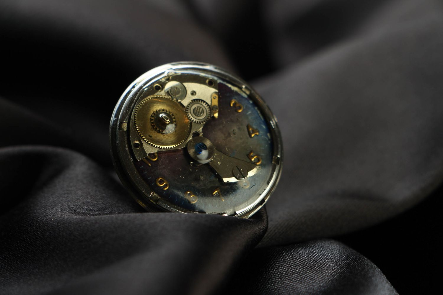 Large round metal ring in steampunk style photo 1