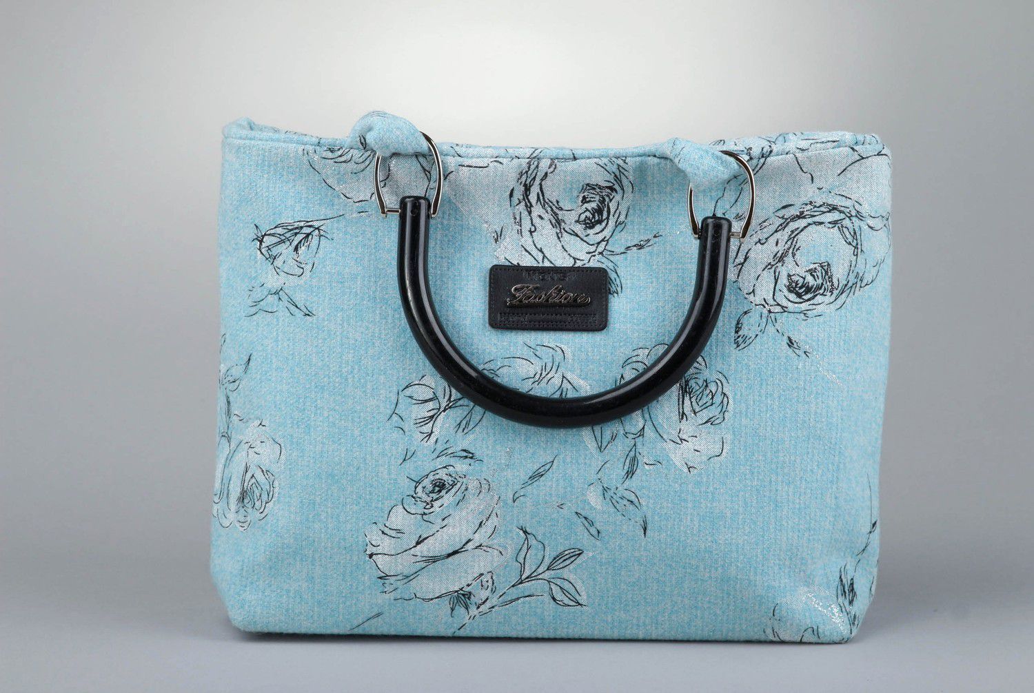 Handgemachte blaue Handtasche aus Textil foto 2